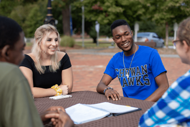 Chowan Students talking in the Courtyard