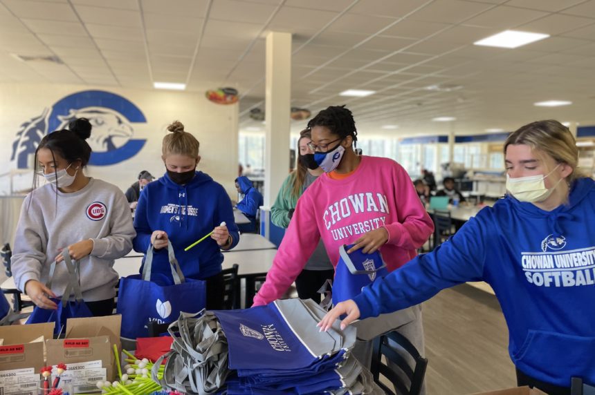 Chowan University Students pack Valentine’s Day good bags for senior adults at the Hertford County Office of Aging.