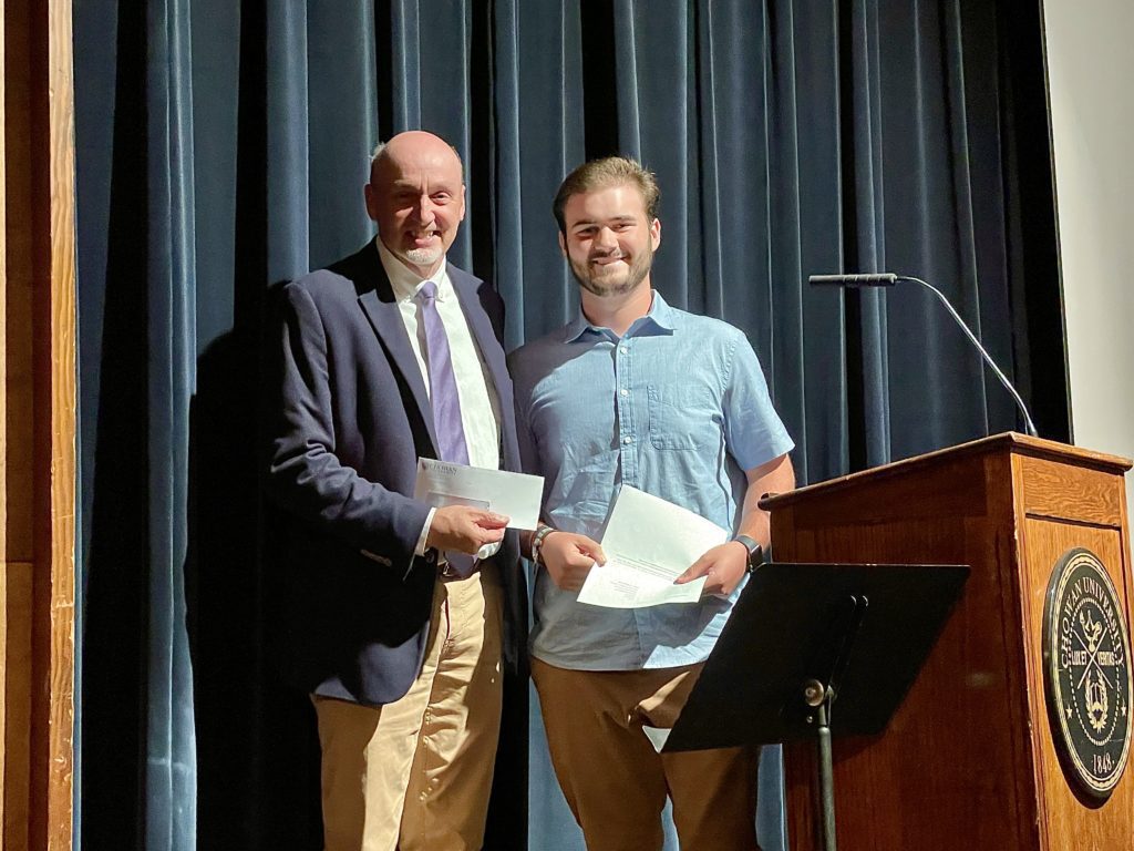 Richard Brunson receives gift from Brayden Conboy