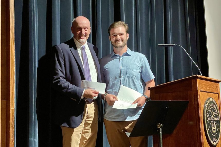 Richard Brunson receives gift from Brayden Conboy