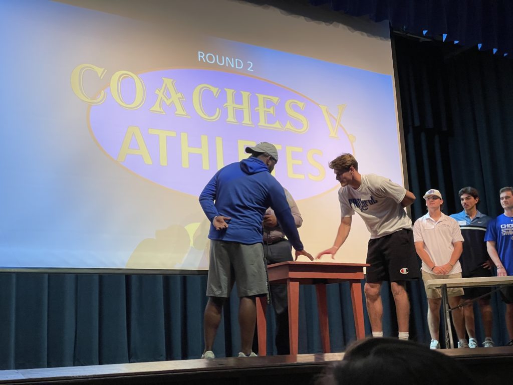 Coach Harris of Cross Country and Women’s Lacrosse goes up against Skyler Davies of Men’s Basketball in a round of Family Feud.
