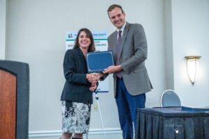 Jessica Drake accepts award for completeing Virginia Rural Leadership Institute Program
