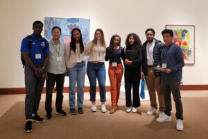 Students pose for photo in Guilford College Library