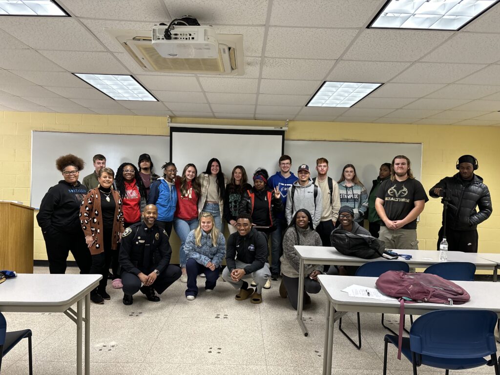Criminal Justice Class poses with SPO Dupree Foster