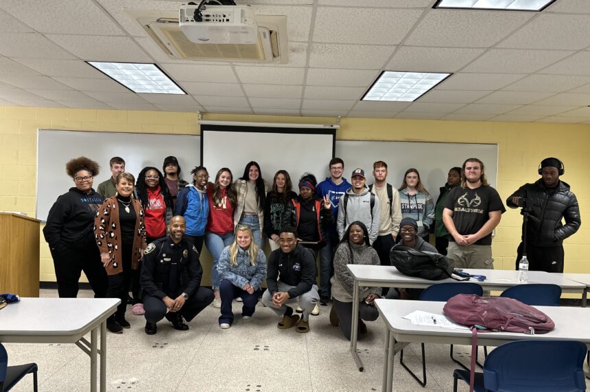 Criminal Justice Class poses with SPO Dupree Foster