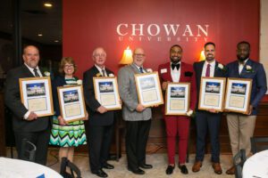 Pictured: Mark Parker (Community Service), Angie Salerno (Distinguished Alumna), James Moore (Distinguished Alumnus), Alton Parker (Community Service), Chris Moore (Distinguished Alumnus), Nicola Khoury (Distinguished Alumnus), Vaughn Byrd (Distinguished Alumnus). Not pictured Grace Brown (Community Service).