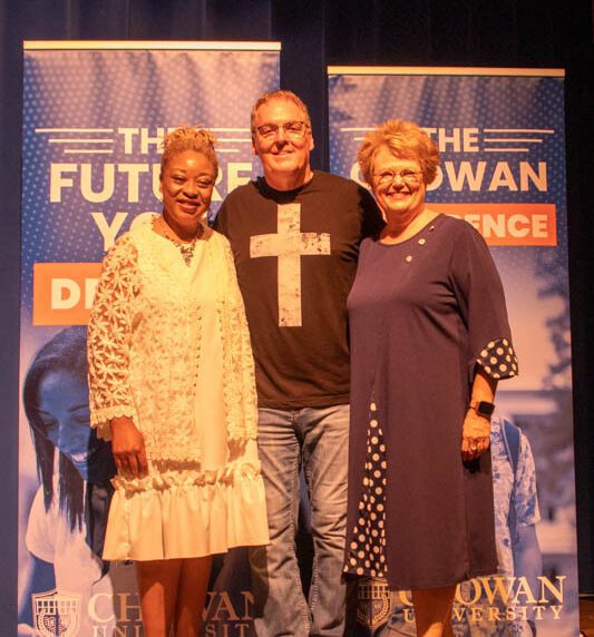 Brad Ford stands with Dr. Rosemary M. Thomas (right), President and Dr. Jill Awuni (left), Assistant Professor of Religion and Business Administration; Director of International Students.