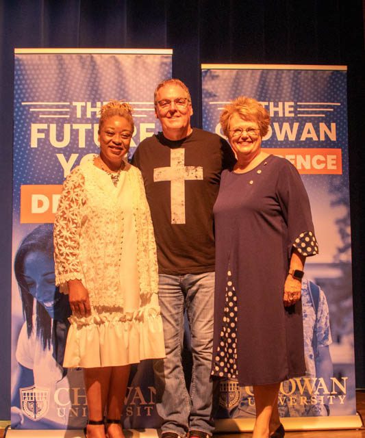 Brad Ford stands with Dr. Rosemary M. Thomas (right), President and Dr. Jill Awuni (left), Assistant Professor of Religion and Business Administration; Director of International Students.